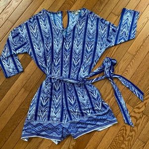 Blue and white romper with tie in front/back